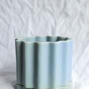 Ceramic planter handmade by Ella Reweti using slipcasting techniques. Ella is an Australian ceramicist based in Melbourne where she creates contemporary ceramics using slipcasting techniques and playing with form.