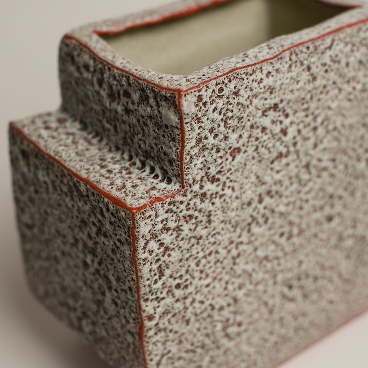 SHARON ALPREN is a Melbourne based ceramic artist based in the Macedon Ranges. Working predominantly with richly coloured and textured stoneware clays and glazes, her work strikes a balance between creating both functional and sculptural pieces for the home.  Sharon took up ceramics 15 years ago after relocating to Australia from her native UK where she had a background in Textiles.