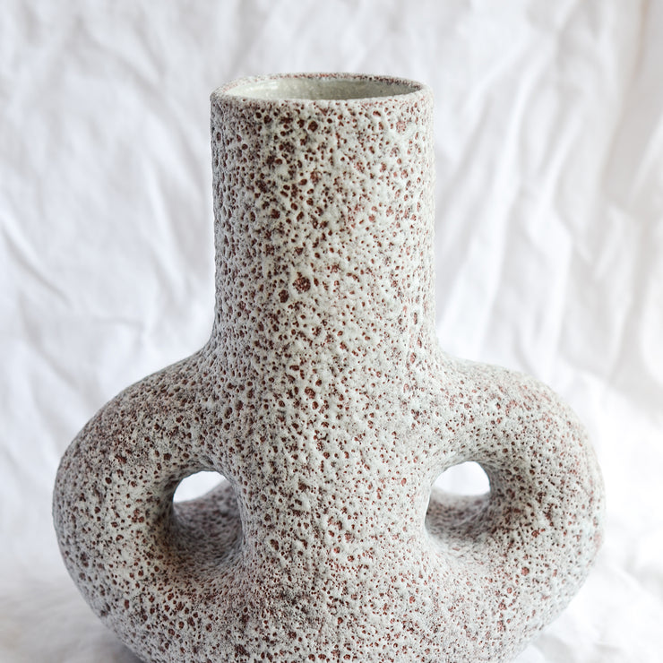 Ceramic Vase handmade by London born, Melbourne based potter Sharon Alpren. Sharon makes sculptural, yet practical pieces for the home. The characteristics of the clay, the glaze and the fire direct her hand-built and wheel-thrown contemporary ceramics. 